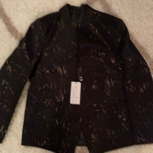 This is a sports dinner jacket  black and gold with gold buttons very sharp.